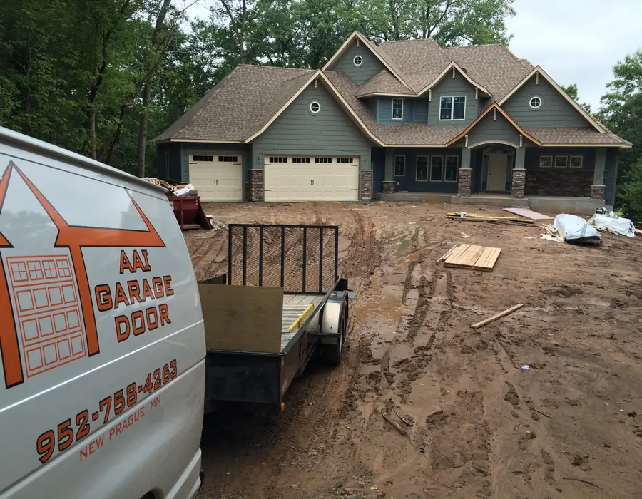 AAI Garage Door service vehicle at a local garage door project